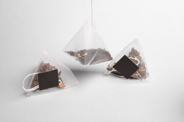 Tea bag Pyramid on gray background