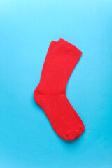 Red sock on a blue background