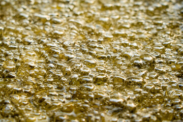 closeup of hot bubbling boiling oil background.
