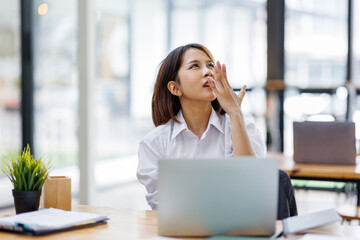 asian woman work at laptop thinking of problem solution, thoughtful female employee pondering...