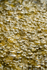closeup of hot bubbling boiling oil background.