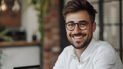 Happy Young Professional Man in Office Attire Smiling at