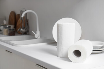 Rolls of paper towels on counter in kitchen, closeup