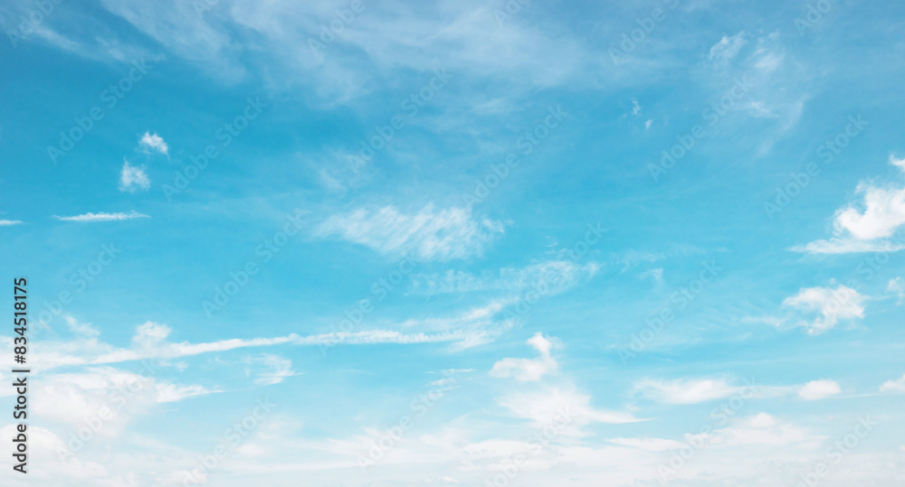 Wall mural clear blue sky with a few clouds