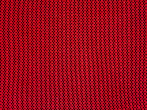 Red breathable porous poriferous material for air ventilation with holes. Sportswear material nylon texture.