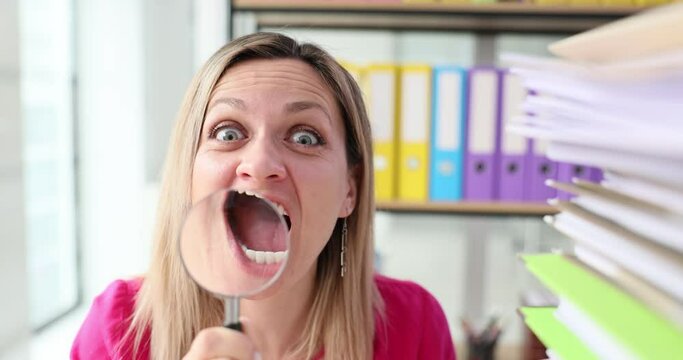 Funny faces with magnifying glass and a woman mouth closeup