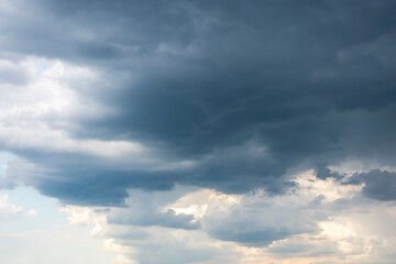 Dark cumulus clouds on a summer evening.