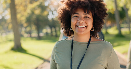 Black woman, portrait and happy in park for charity, volunteer and community service work with...