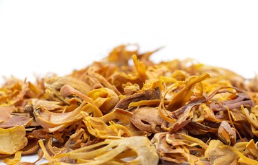 Closeup of Mace or Nutmeg Aril Heap Isolate on White Background with Copy Space, Also Known as Javitri or Myristica Fragrans
