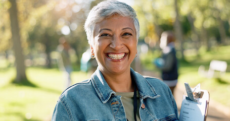 Woman, portrait and clipboard outdoor as volunteer or survey, happy for results of market research. Female entrepreneur, paper form and information for charity business, outreach for startup in USA