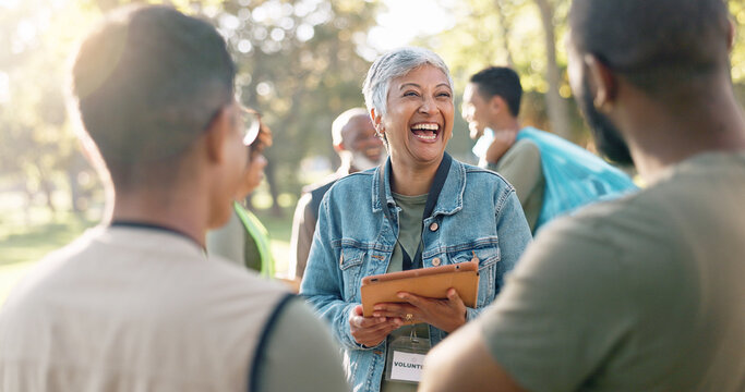 Park, woman and laugh planning with tablet for volunteer teamwork, community project or nature sustainability. Humanitarian, recycling or senior leader in charity service or NGO for pollution cleanup
