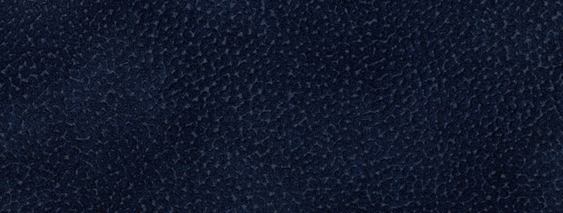 Navy blue matte background of suede fabric, closeup. Velvet texture of seamless ultramarine...