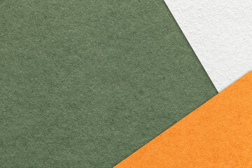 Texture of craft olive color paper background with white and orange border. Vintage abstract green cardboard.