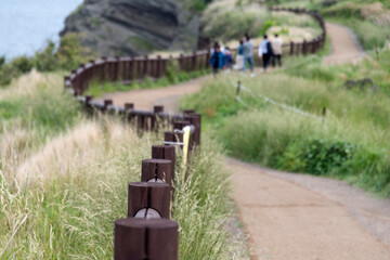 View of the walkway on the cliff at the seaside