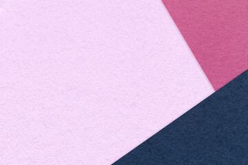Texture of craft light lilac color paper background with purple and navy blue border. Vintage abstract pink cardboard.