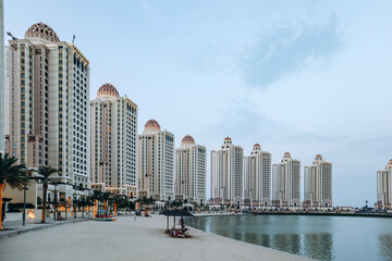 Doha, Qatar - 1 May 2024: The Pearl, a man-made island near Doha's prestigious West Bay District. Featuring Mediterranean-style yacht-lined marinas, residential towers, villas, and hotels