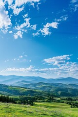 Obraz premium A serene mountain landscape with clear blue skies and rolling hills, offering a large area of copy space in the sky.