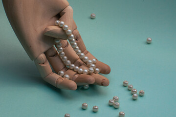 hand with pearls and bracelet