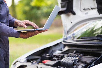 car service center mechanics are checking condition car and engine make sure they are ready use and in perfect condition according center warranty. periodic vehicle inspections for safety in driving.
