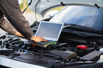 car service center mechanics are checking condition car and engine make sure they are ready use and...