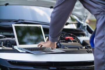 car service center mechanics are checking condition car and engine make sure they are ready use and...