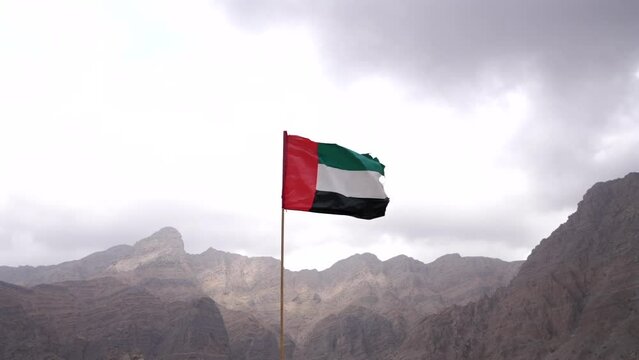 View of the UAE flag in the mountains