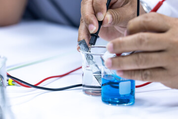 Electroplating experiment in chemistry laboratory.