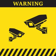 Warning symbol on yellow background with black silhouettes of security cameras