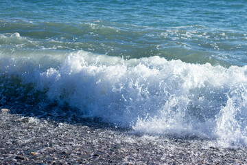 Fototapeta premium Sea wave crashing on the shore