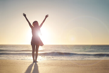Woman, hands up and winner with silhouette at beach with sunset sky, mock up space and celebration....