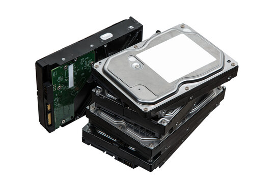 Hard drives stacked on top of each other. SATA 3.5 HDD for information storage. Isolate on a white back.