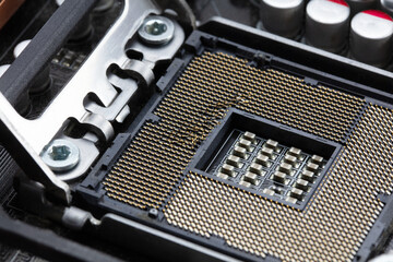 Damaged CPU socket. CPU socket with bent CPU contact terminals.