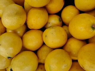 tasty fresh lemon. healthy fruit background, sign and symbol.