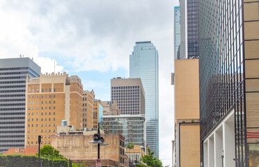 Downtown city buildings and skyscrapers. Photo taken in Dallas Texas on a cloudy day