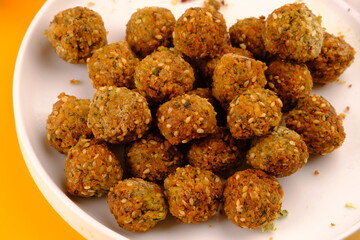 Falafel is a deep-fried ball or patty made from ground chickpeas, fava beans, or both. Falafel is a traditional Middle Eastern food, commonly served in a pita, which acts as a pocket, or wrapped. 