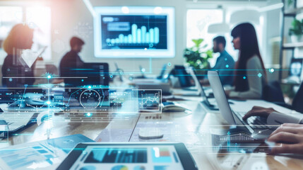 Colleagues are sitting in the office at a meeting. A team of office workers with laptops are sitting at a conference table with a modern digital panel on the wall. Business, marketing concept.