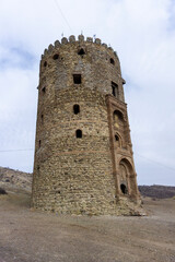 Side view of Vashlovani tower. Beautiful brick entrance, windows and loopholes