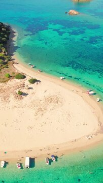 Aerial view o a beautiful wild beach on Marathonisi Island near Zakynthos island in Greece. Marathon island at sunrise in Zante, Ionian sea. Paradise island with turquoise sea water.