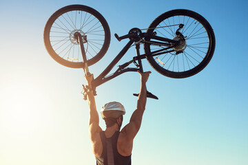 Man, outdoor and bicycle for success or achievement, personal goal and fitness milestone or...