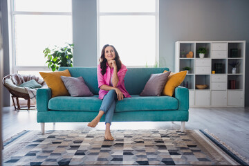 Obraz premium Photo of adorable lovely retired lady wear trendy clothes sitting sofa living room daylight indoors
