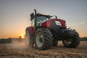 Obraz premium side profile of the tractor, highlighting its wheels, cab, and body