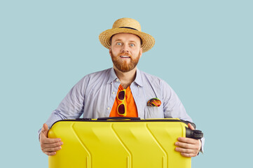 Happy summer vacation man, traveler in beach wear, tourist with yellow luggage, traveling for...