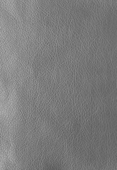 Texture of genuine leather, artificial leatherette grey background