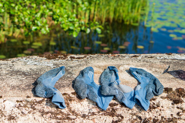 Socks drying on a camping trip. Hiking clothes, equipment.
