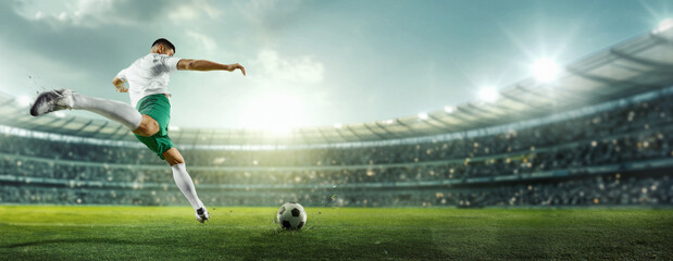 Cinematic image of penalty. Focused on game, running soccer, football player at stadium during...