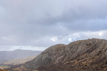 Majestic Mountains and Cloudy Sky in Norway.