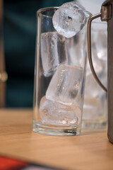 Close up of a glass of ice in table dinner