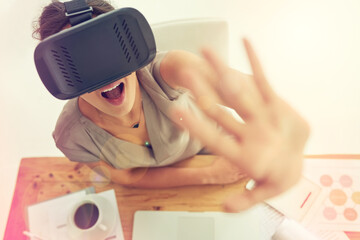 Woman, interface and touch in office with virtual reality tech for ui, wow and futuristic innovation. Person, surprise and AR glasses for programming, shock and IT for user experience in workplace