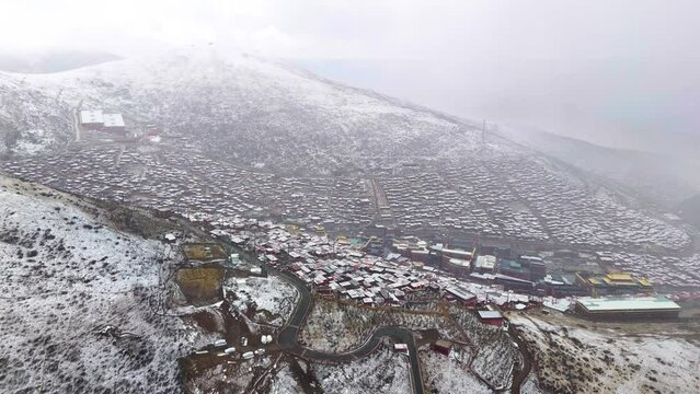 Buddhist academy in the mountains of Sichuan Sertar County, Larung Gar, Buddhism center in snow