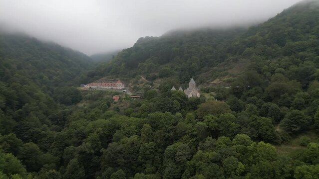 Haghartsin Monastery in misty mtn valley forest near Dilijan, Armenia